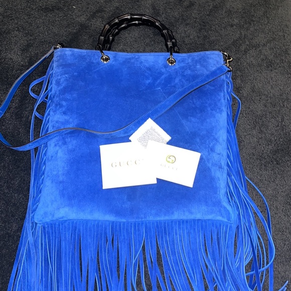 Gucci Handbags - GUCCI suede cobalt bamboo handle with fringe